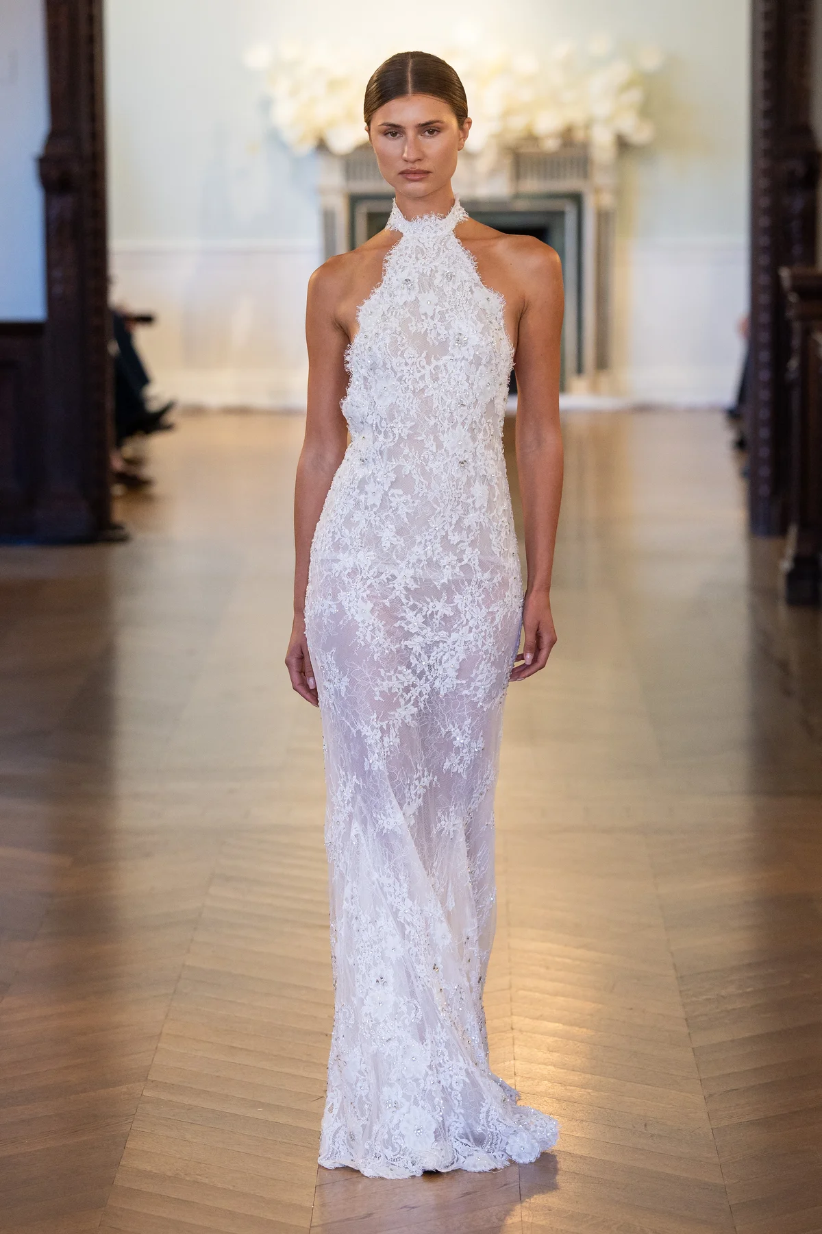 Made-to-order gown by Lee Petra Grebenau — embroidered lace gown with halterneck