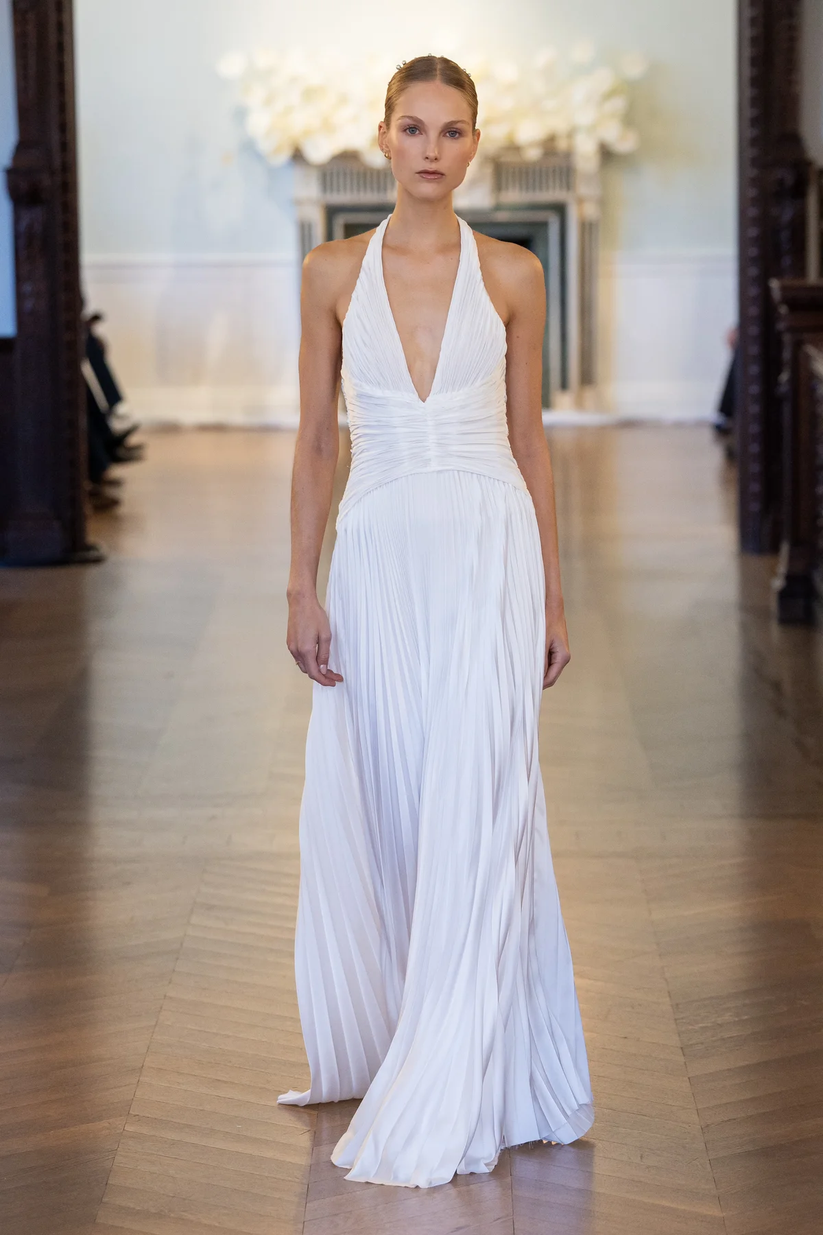 Made-to-order gown by Lee Petra Grebenau — gown with deep V-neck and V-neck