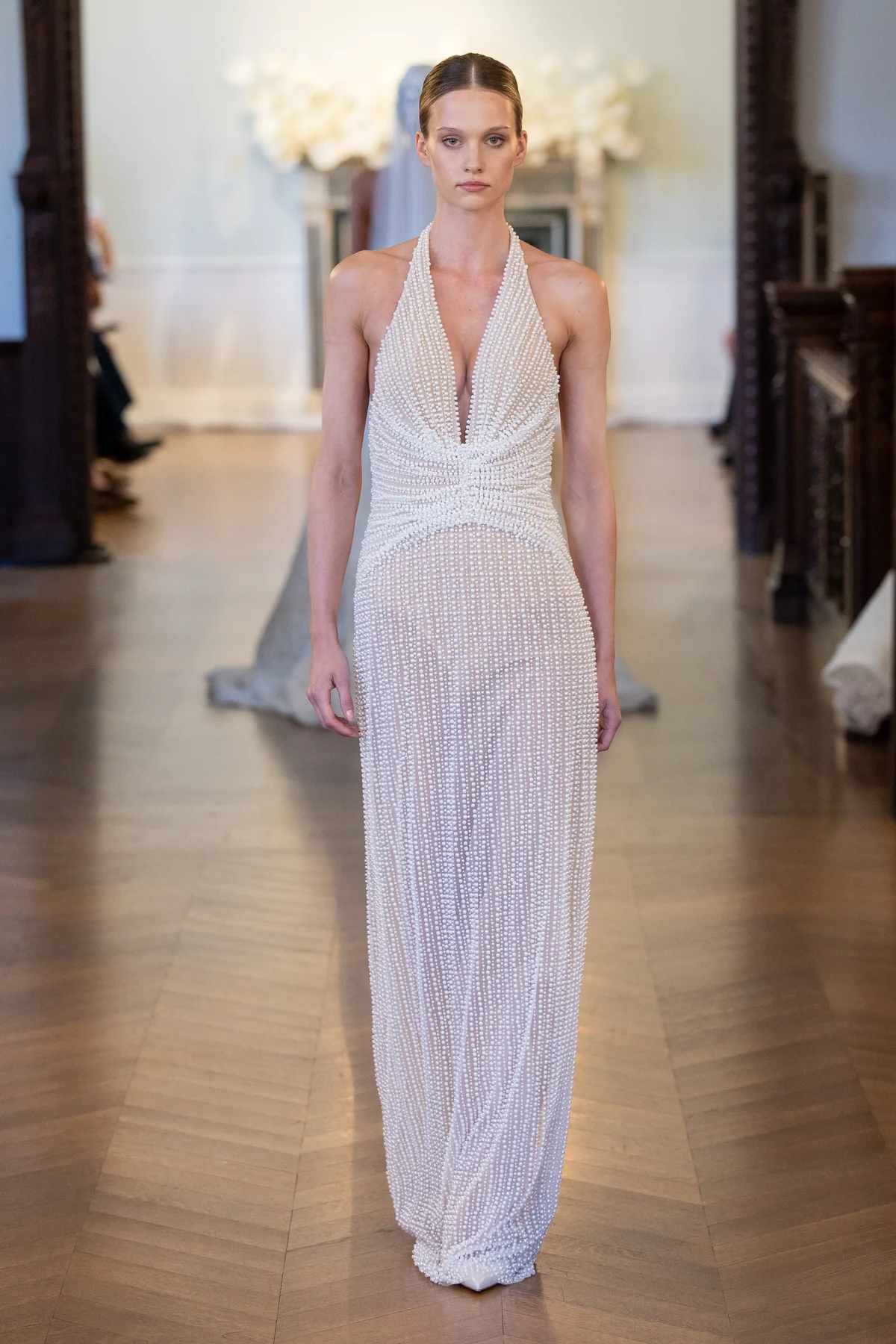 Made-to-order gown by Lee Petra Grebenau — gown with deep V-neck and V-neck